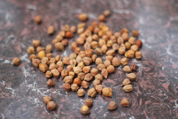 Chickpeas on a tiles background