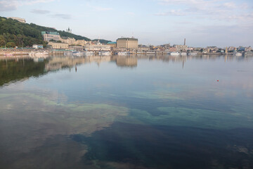 Fototapeta premium KYIV, UKRAINE - July 21 2019: peaceful sunrise in the morning on the Podil street in Kyiv, Ukraine