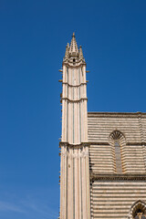 Detail of the facade famous cathedral Santa Maria Assunta made of mosaic scenes from the bible...