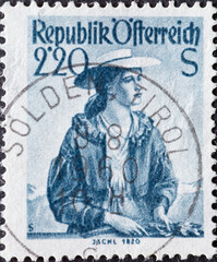 Austria - circa 1952: a postage stamp from Austria, showing a woman with traditional provincial...