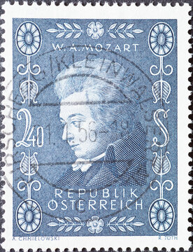 Austria - circa 1956: a postage stamp from Austria, showing a portrait of the composer, musician, genius Wolfgang Amadeus Mozart. Drawing decorated with flowers