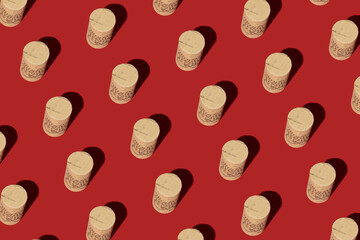 Seamless pattern made of wine corks on red background. Isometric view. Wine drinking culture concept. Apperetes and survivors. Copy space.