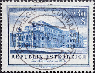 Austria - circa 1955: a postage stamp from Austria, showing a historic building : Reopening of the...