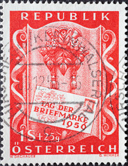Austria - circa 1956: a postage stamp from Austria, showing a decorated tablet with flower basket &...