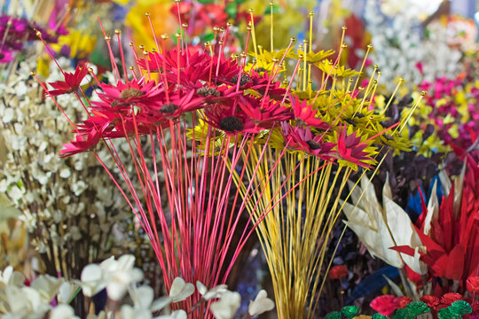 Artificial flowers made out of colored plastics, handicrafts on display during the Handicraft Fair in Kolkata , earlier Calcutta, West Bengal, India. It is the biggest handicrafts fair in Asia.