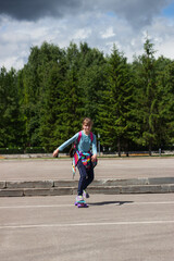 Obraz premium Beautiful girl skateboard energy skateboard dynamic city outdoor.