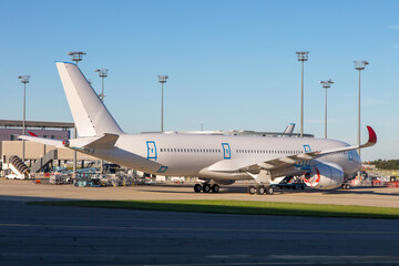 White passenger aircraft mothballed for storage. Side view. Close-up.