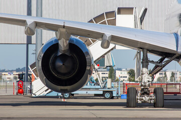 Engine of modern passenger jet plane. Сlose up back view.