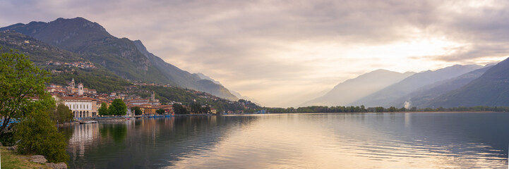 Nice view of Lake Iseo at sunrise, on the left the city of lovere which runs along the lake,Bergamo Italy.