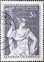 Austria - circa 1961: a postage stamp from Austria, showing the messenger of the gods Hermes with herald's staff and globe. World Bank Congress, Vienna