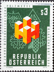 Austria - circa 1976 : a postage stamp from Austria, showing a graphic for the Austrian Wood Fair, Klagenfurt. 25 years
