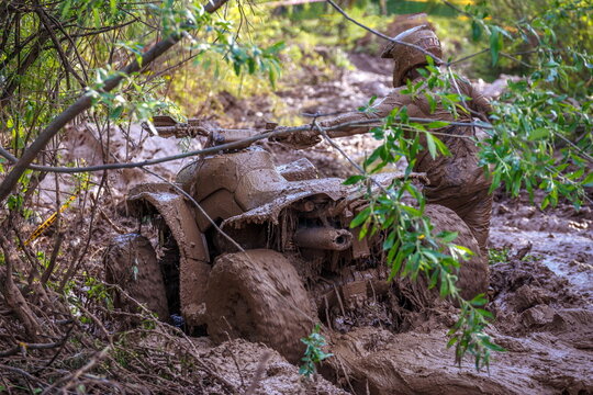 Russia, Samara, June 2017: The Driver Of The ATV Drowned In The Mud And Can Not Leave On A Summer Day.