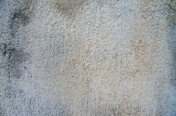 Old concrete wall background. Grey cement or stone wall surface with dirty and damage.