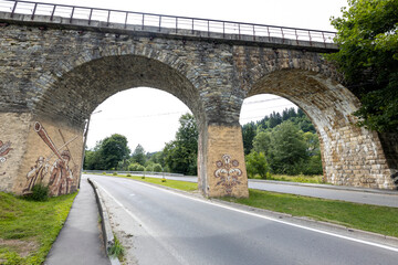 Old railway arch bridge. Panorama.