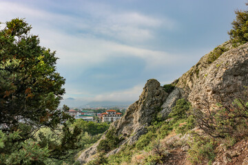 View from the mountains to the town of Sudak, Crimea. Stones close-up, copyspace.