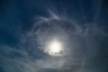 Amazing  rainbow ring  around sun in cloudy day.Fantastic Natural solar effect. 
 Beautiful diamond...