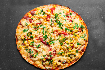 delicious pizza close up. carbonara with fresh vegetables. large pie with vegetable filling. fast food concept