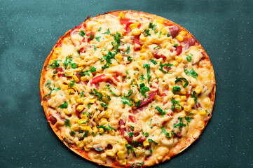 delicious pizza close up. carbonara with fresh vegetables. large pie with vegetable filling. fast food concept