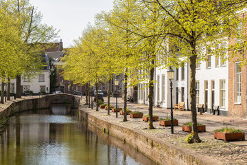 Fototapeta na wymiar Canal with canal houses in the center of the historic city of Amersfoort.
