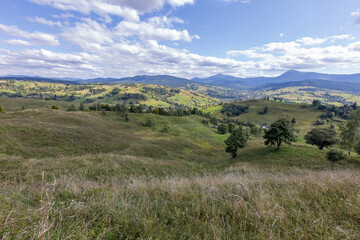 Panorama of mountains in the Ukrainian Carpathians on a summer day.