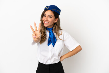 Airplane stewardess over isolated white background happy and counting three with fingers