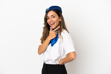 Airplane stewardess over isolated white background smiling