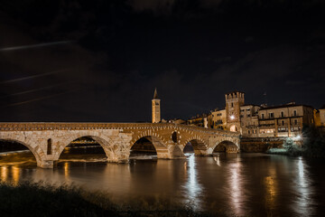 Fototapeta na wymiar Night Photos from the bank of Adige river, Verona, Italy, 13.07.2021