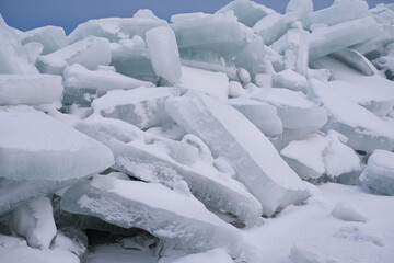 Fototapeta na wymiar Ice hummocks, a heap of ice fragments on the Baltic Sea, compression of the ice cover