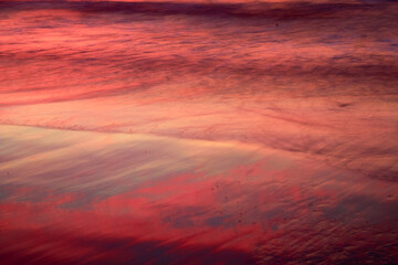 Fototapeta textura color roja de la arena y el mar al atardecer  obraz
