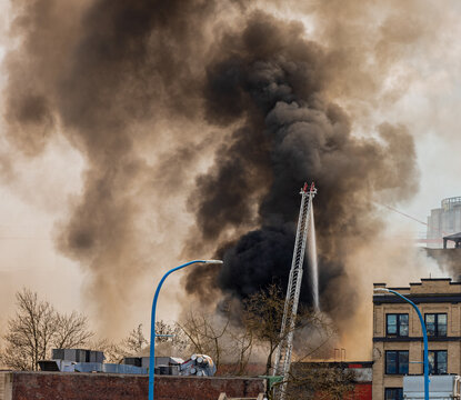 Over 7O Firefighters extinguishing a fire of Hotel Winters in Gastown, 115 years old heritage brick mixed-use building