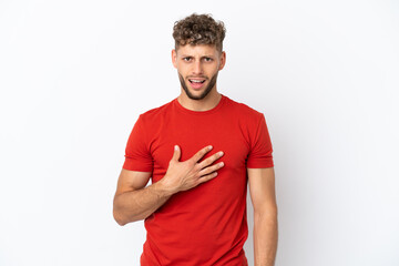Fototapeta premium Young caucasian handsome man isolated on white background pointing to oneself