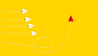 red paper airplane airplane, yellow airplanes in different direction.new idea, change, trend, courage, creative solution, innovation concept.