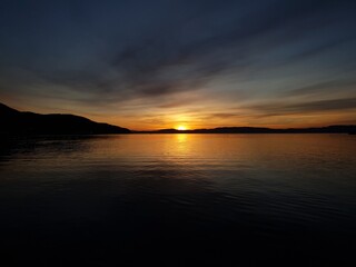 sunset over the mountains and water - Trondheim