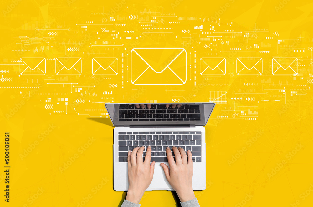 Poster email concept with person using a laptop computer