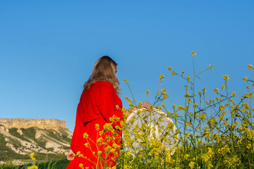 Girl in a field with flowers