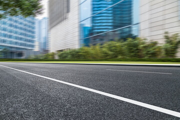 Empty urban road and modern office buildings