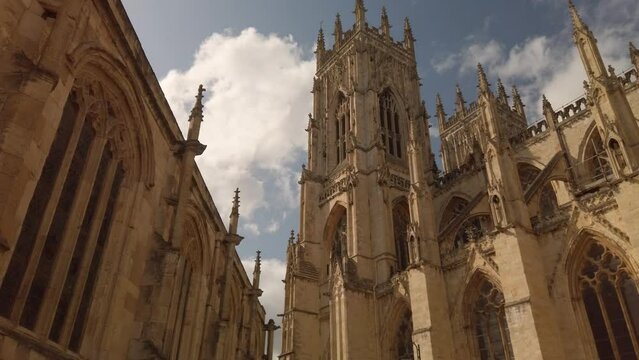 York Minster in evening sunshine.  Wide. Pan Right