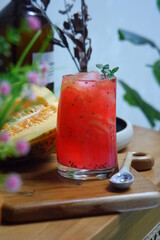 a glass of  squash cocktail 