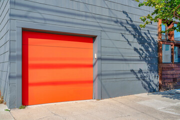 Garage exterior with orange canopy door at San Francisco, California