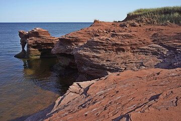 Fototapeta na wymiar Sandstone cliffs along coastline of Kildare Capes, Prince Edward Island, Canada