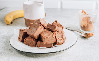 Raw vegan chocolate fudge. Healthy vegan food concept.
