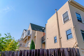 Low angle view of residential buildings with vinyl lap sidings and balconies in San Francisco, CA