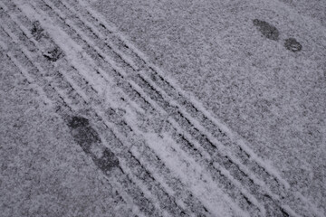 Footprints on the snowy road