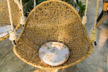 rattan swing seat in the coffee shop.
