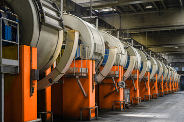 Tannery. Large metal barrels for leather dyeing