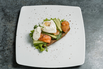 sandwich with salmon and vegetables