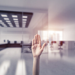 Choosing gesture of person in elegant modern interior in sunshine light