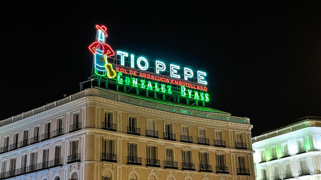 The iconic Tio PEPE sign displayed in Puerta del Sol, a symbol such as the others in the square: The Post Office clock or the Mariblanca statue