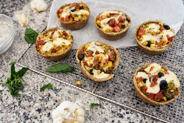 Protein breakfast egg muffins with bacon and vegetables. Low carb diet breakfast.