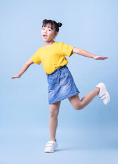 Image of Asian child posing on blue background